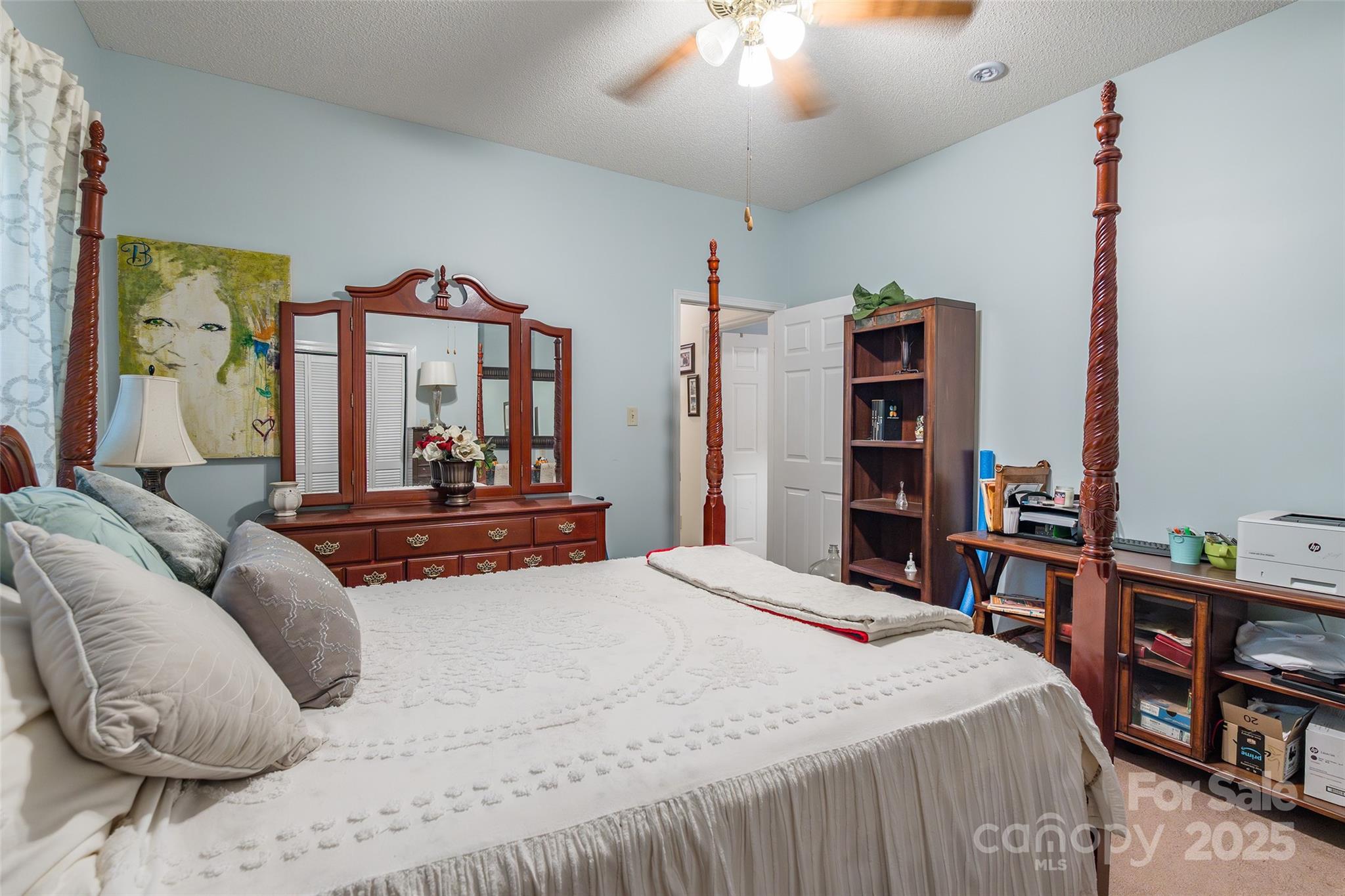 880 Columbia Road Chester, SC 29706 - Photo 21 of 40 a bedroom with a bed and a large cabinets