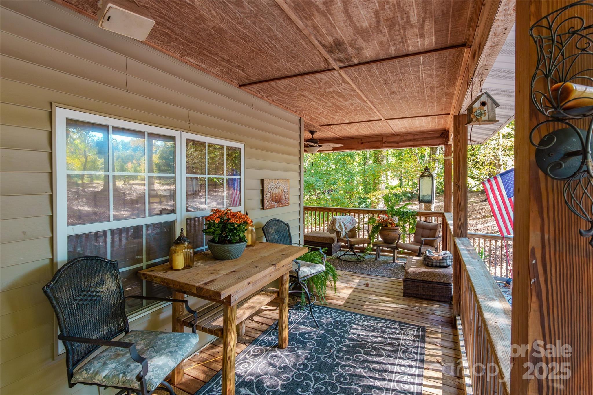 880 Columbia Road Chester, SC 29706 - Photo 5 of 40 a living room with patio furniture and a floor to ceiling window
