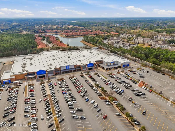 an aerial view of city and ocean