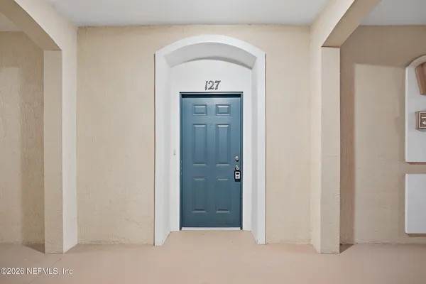 a view of a hallway with a elevator