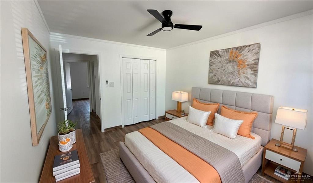 2714 West Mile 17 1/2 Road, Unit 18 Edinburg, TX 78541 - Photo 9 of 11 Bedroom with ornamental molding, a ceiling fan, a closet, and dark wood-type flooring- property is virtually staged
