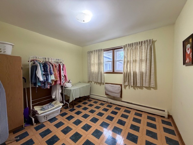 5563 Stone Drive Clinton, IL 61727 - Photo 23 of 34 a bedroom with a bed and a window