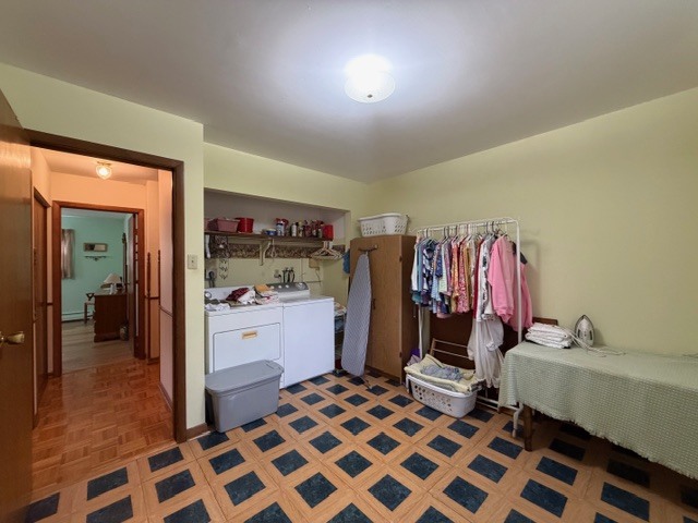 5563 Stone Drive Clinton, IL 61727 - Photo 24 of 34 a room with a baby crib and a dresser