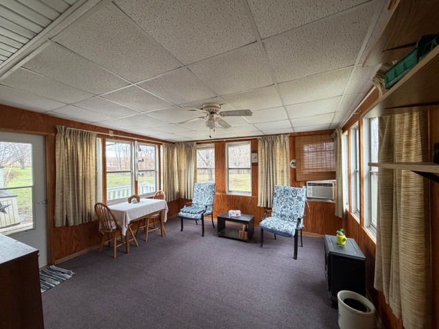 5563 Stone Drive Clinton, IL 61727 - Photo 25 of 34 a living room with furniture and a flat screen tv