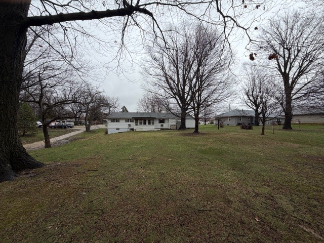 5563 Stone Drive Clinton, IL 61727 - Photo 30 of 34 a view of yard with tree s