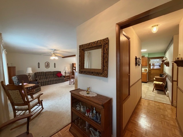 5563 Stone Drive Clinton, IL 61727 - Photo 3 of 34 a living room with furniture and a flat screen tv