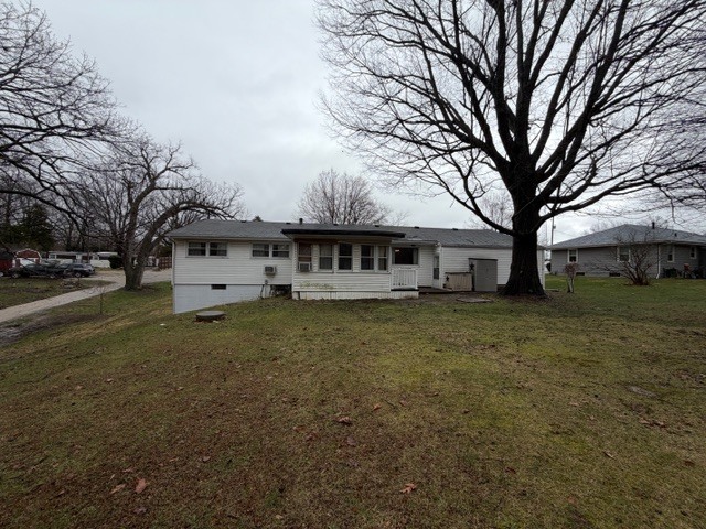 5563 Stone Drive Clinton, IL 61727 - Photo 31 of 34 a view of a house with a yard