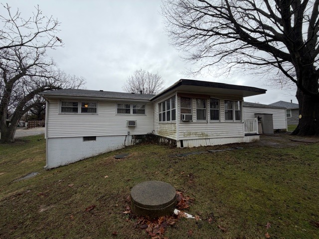 5563 Stone Drive Clinton, IL 61727 - Photo 32 of 34 a front view of a house with yard