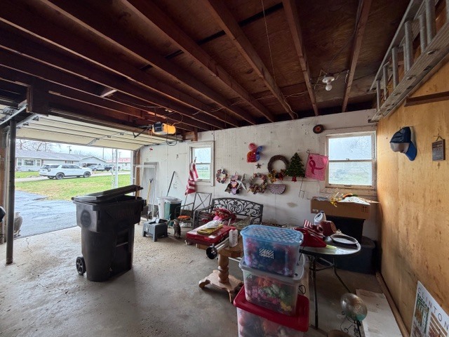 5563 Stone Drive Clinton, IL 61727 - Photo 34 of 34 a living room with lots of furniture and clutter