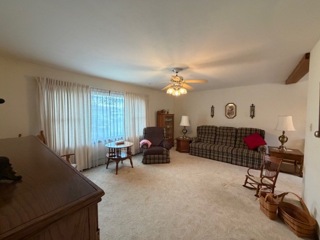 5563 Stone Drive Clinton, IL 61727 - Photo 5 of 34 a view of a livingroom with furniture and a window