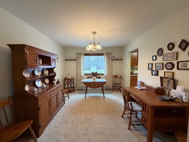 5563 Stone Drive Clinton, IL 61727 - Photo 7 of 34 a workspace with furniture and window