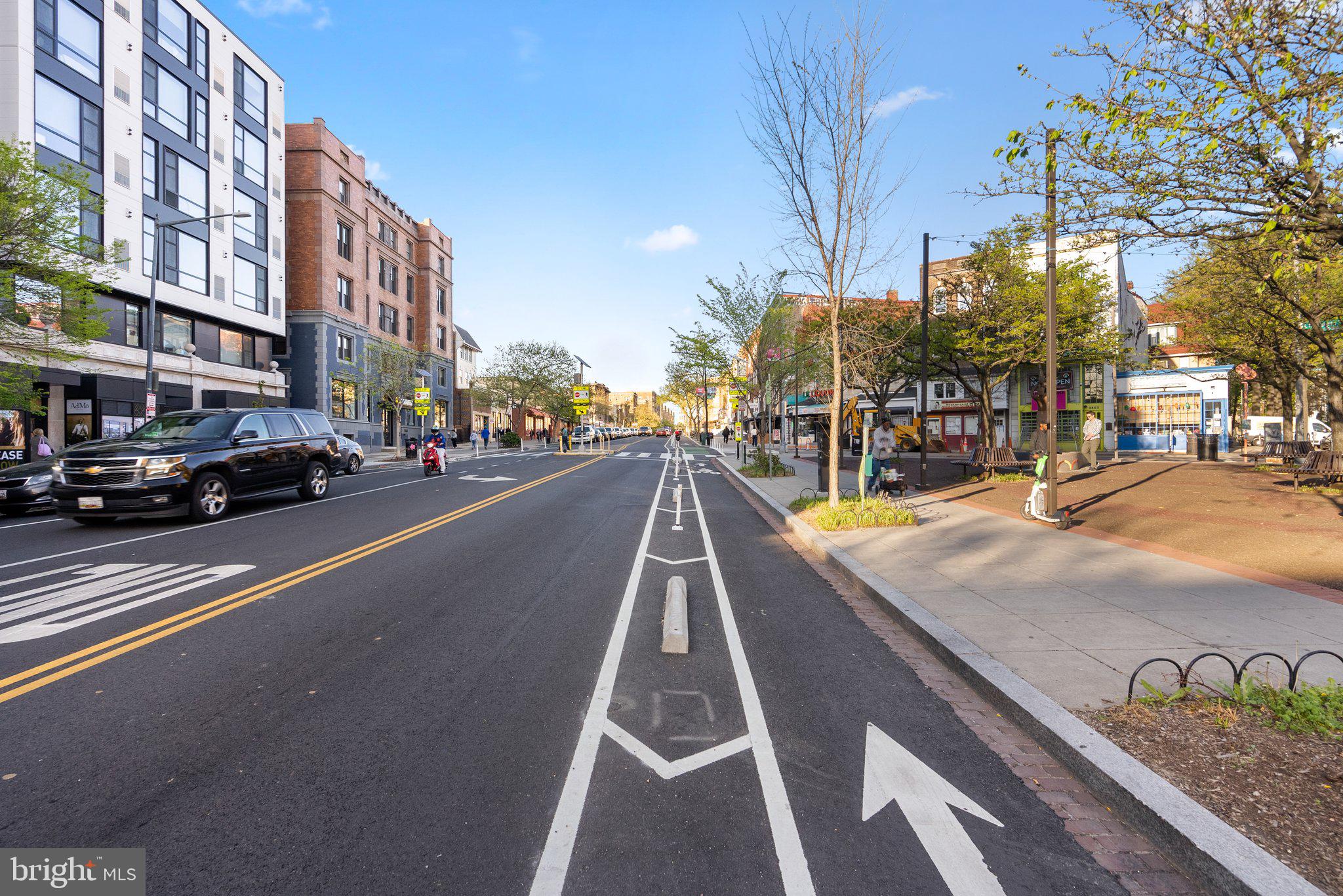 1616 Kilbourne Place Northwest Washington, DC 20010 - Photo 16 of 18 a view of residential houses with cars parked on the roadside