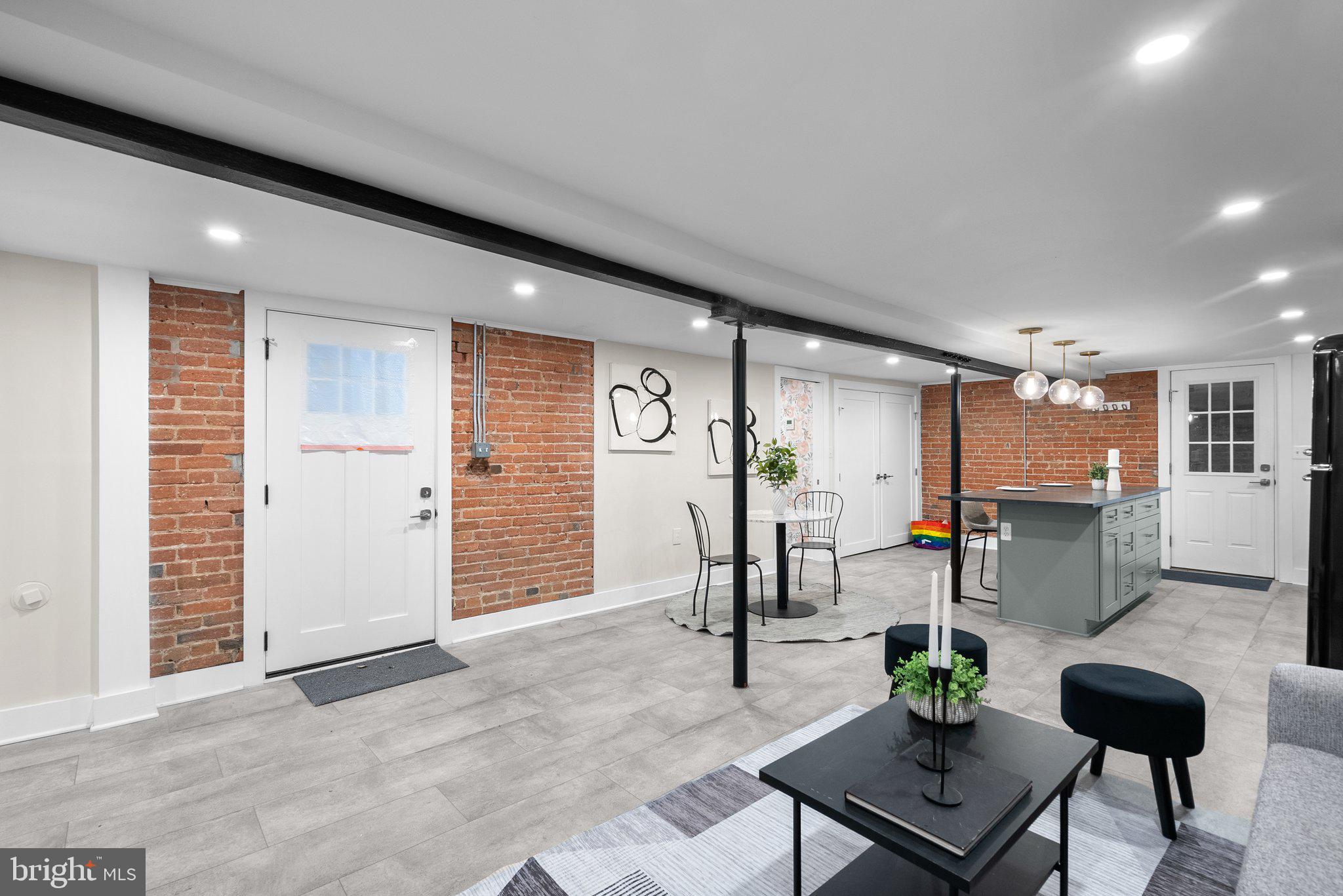 1616 Kilbourne Place Northwest Washington, DC 20010 - Photo 5 of 18 a living room with furniture and wooden floor