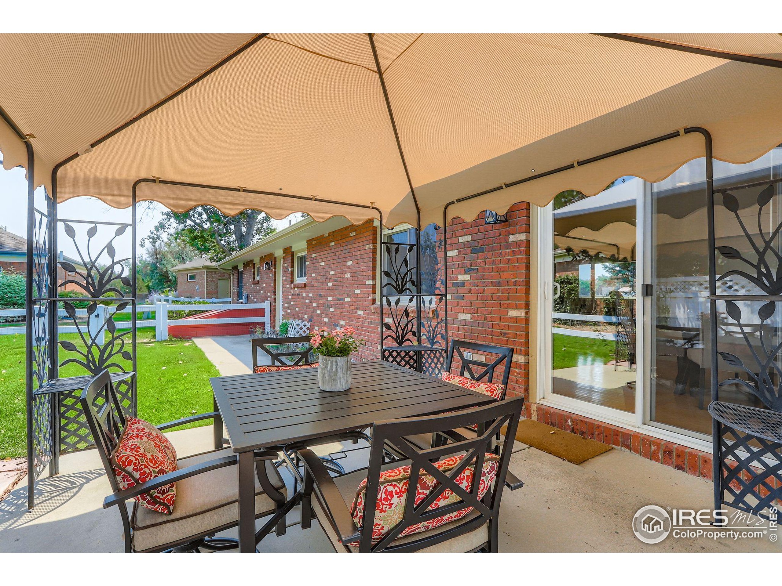 3600 Quail Road Longmont, CO 80503 - Photo 2 of 39 a view of an outdoor sitting area with a couch