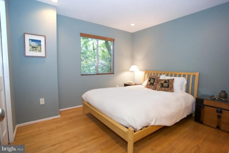 11601 Brandon Hill Way Reston, VA 20194 - Photo 17 of 27 a bedroom with a bed and window