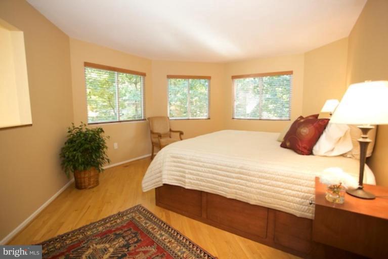11601 Brandon Hill Way Reston, VA 20194 - Photo 19 of 27 a bedroom with a bed and a window