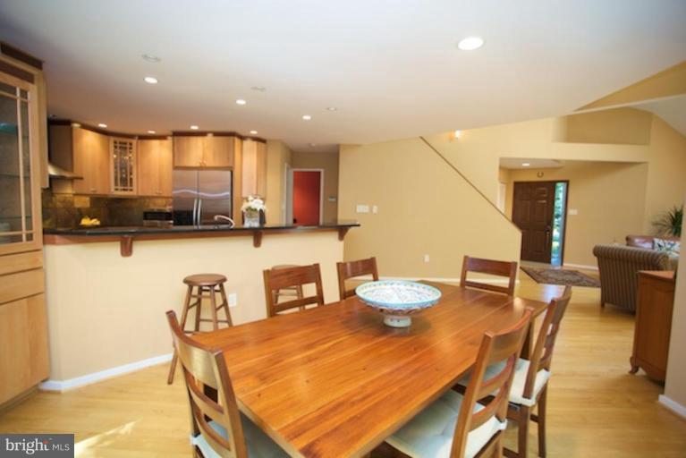 11601 Brandon Hill Way Reston, VA 20194 - Photo 7 of 27 a view of a dining room with furniture