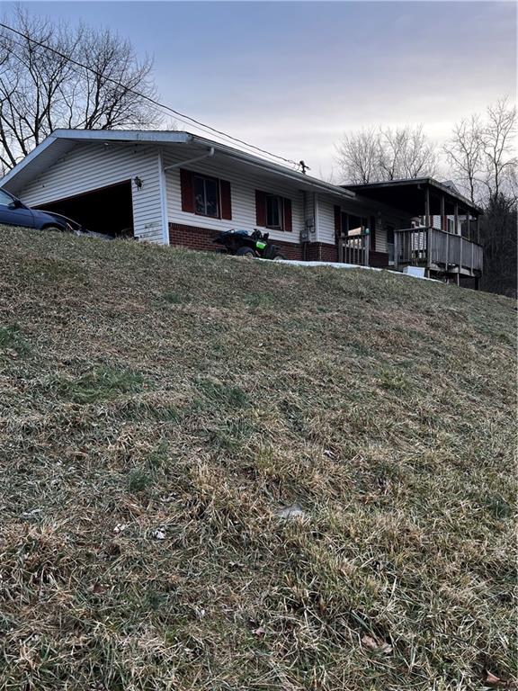 343 Vanderbilt Road Connellsville, PA 15425 - Photo 2 of 33 Side with garage