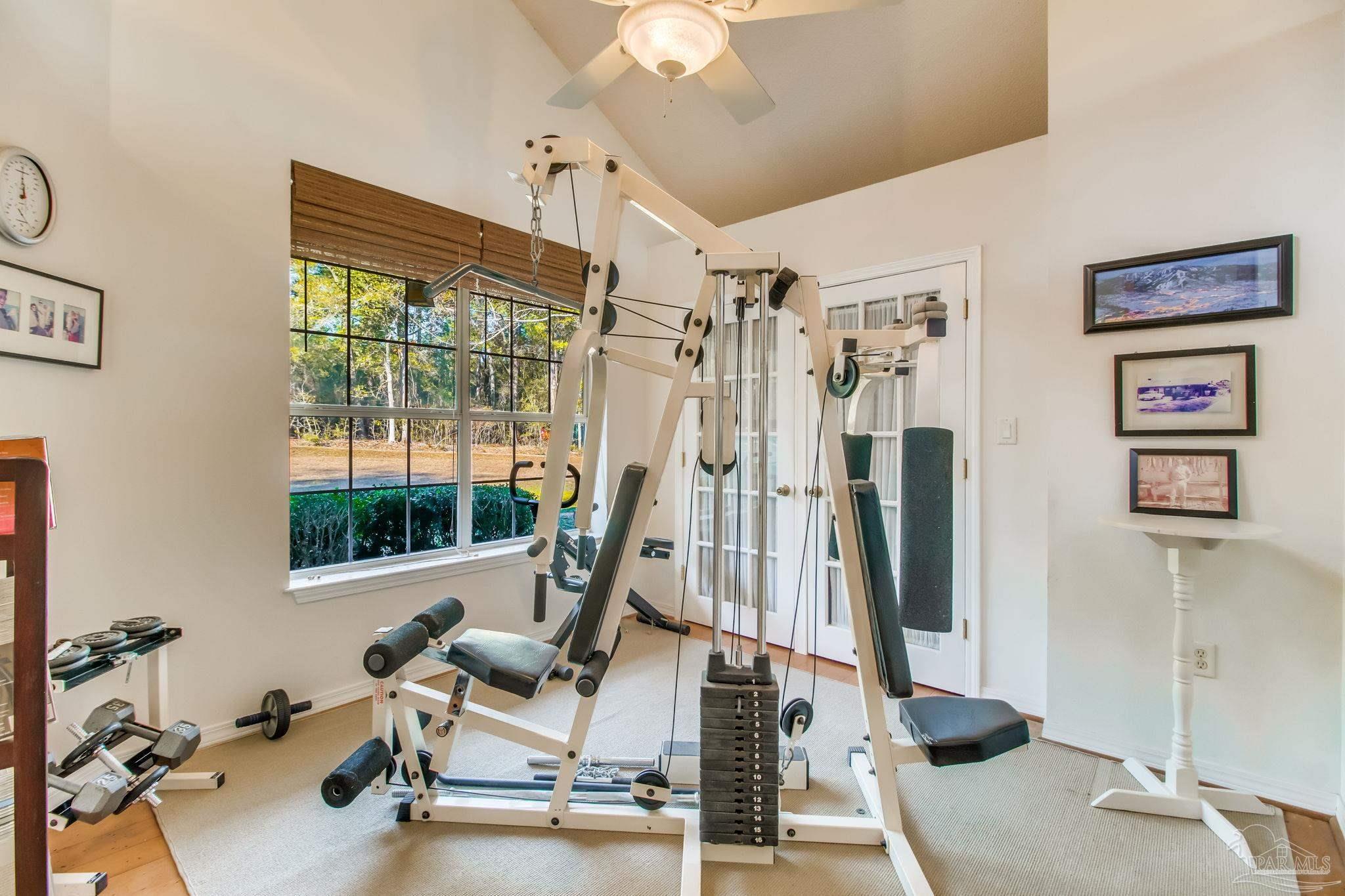 5150-5172 Siripon Road Milton, FL 32570 - Photo 20 of 54 a view of a livingroom with gym equipment