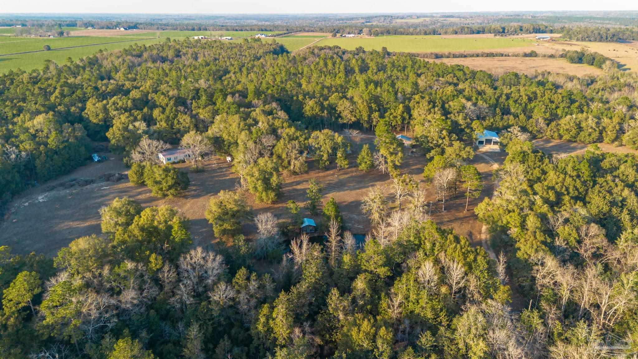 5150-5172 Siripon Road Milton, FL 32570 - Photo 47 of 54 a view of an outdoor space and mountain view
