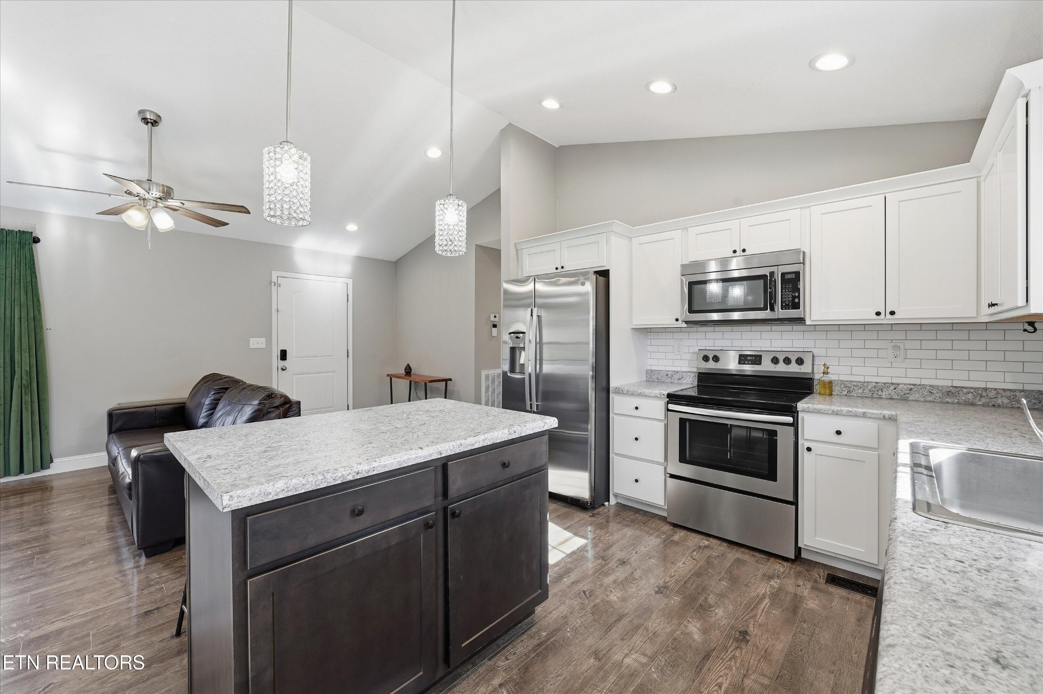 400 Hubbs Grove Road Maynardville, TN 37807 - Photo 17 of 46 a kitchen with a sink stainless steel appliances and white cabinets