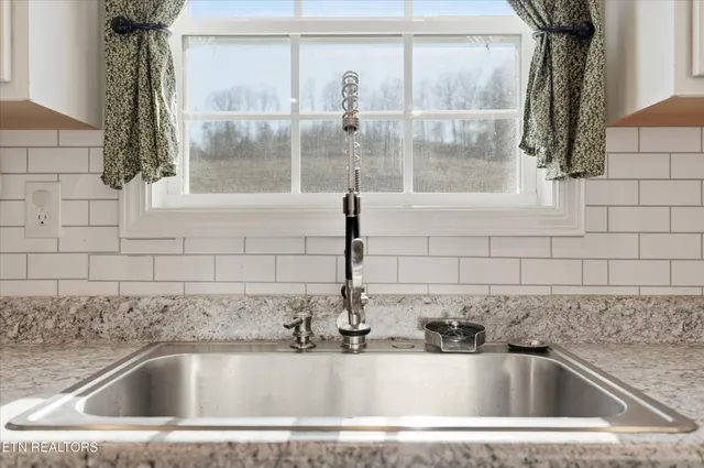 a close view of a sink and faucet
