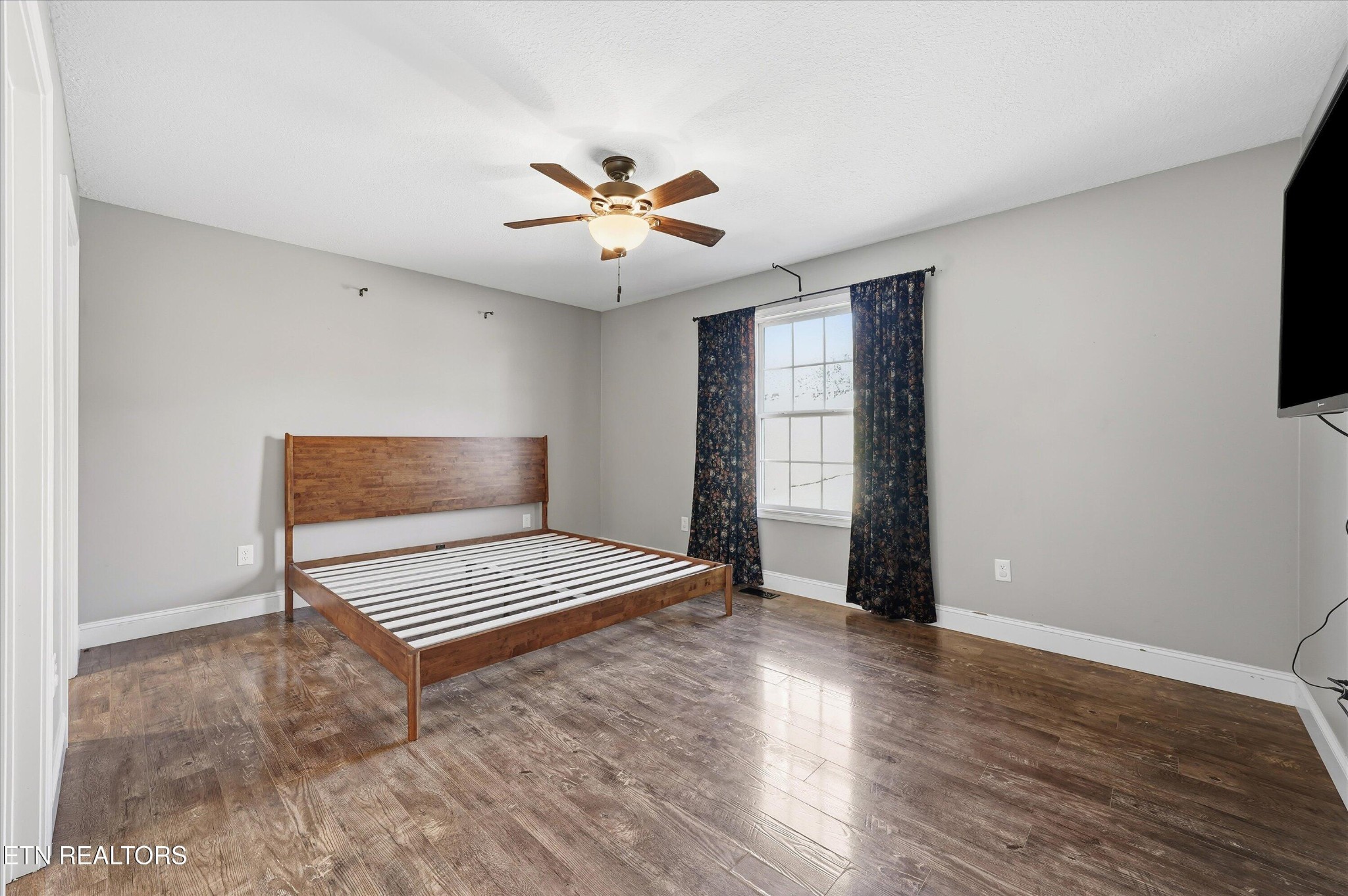 400 Hubbs Grove Road Maynardville, TN 37807 - Photo 24 of 46 wooden floor in an empty room with a window