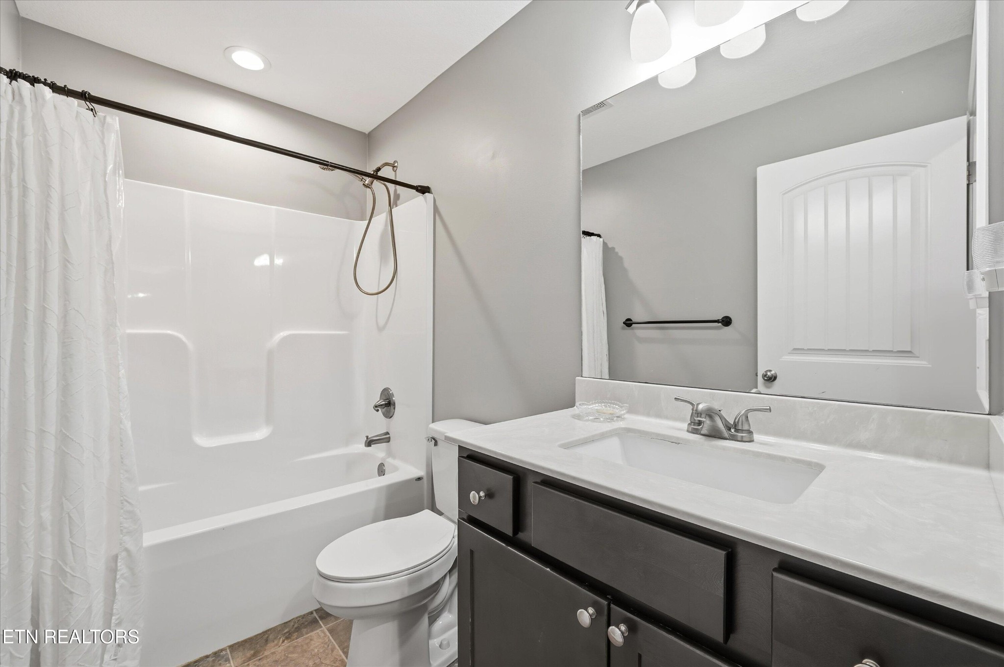 400 Hubbs Grove Road Maynardville, TN 37807 - Photo 29 of 46 a bathroom with a sink a toilet and shower