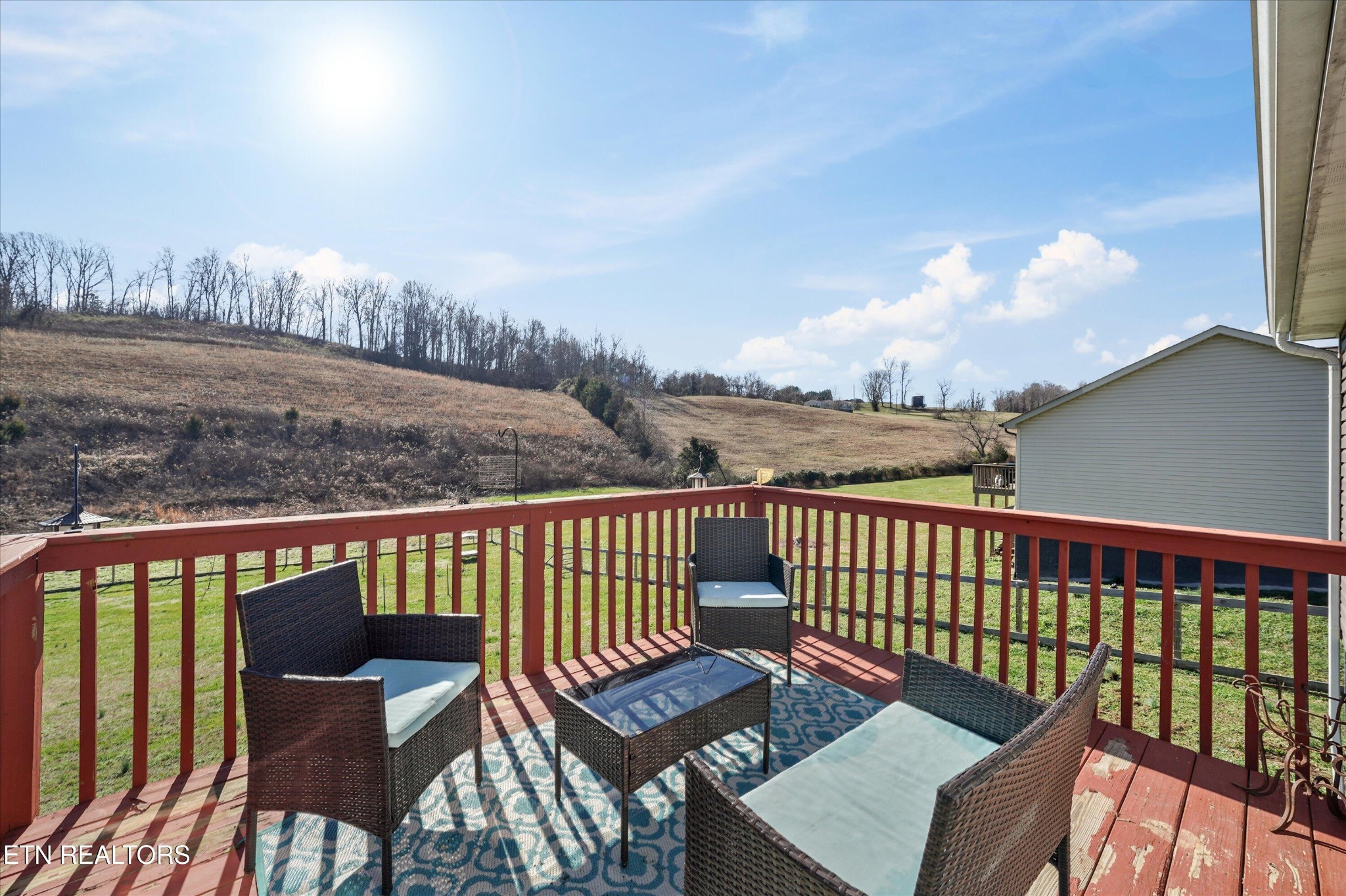 400 Hubbs Grove Road Maynardville, TN 37807 - Photo 34 of 46 a view of a chair and table on the roof deck