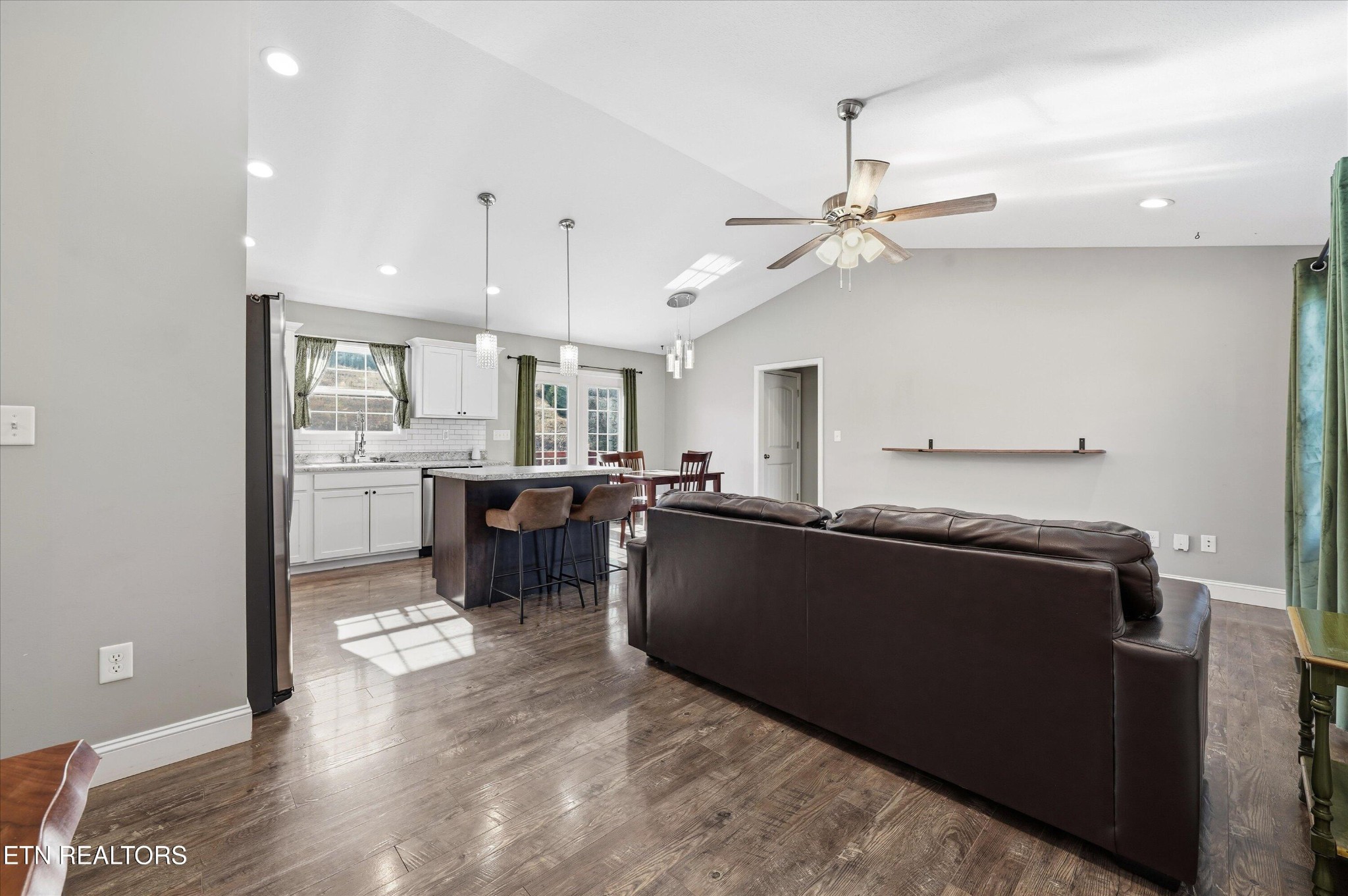 400 Hubbs Grove Road Maynardville, TN 37807 - Photo 7 of 46 a living room with stainless steel appliances kitchen island granite countertop furniture and a fireplace