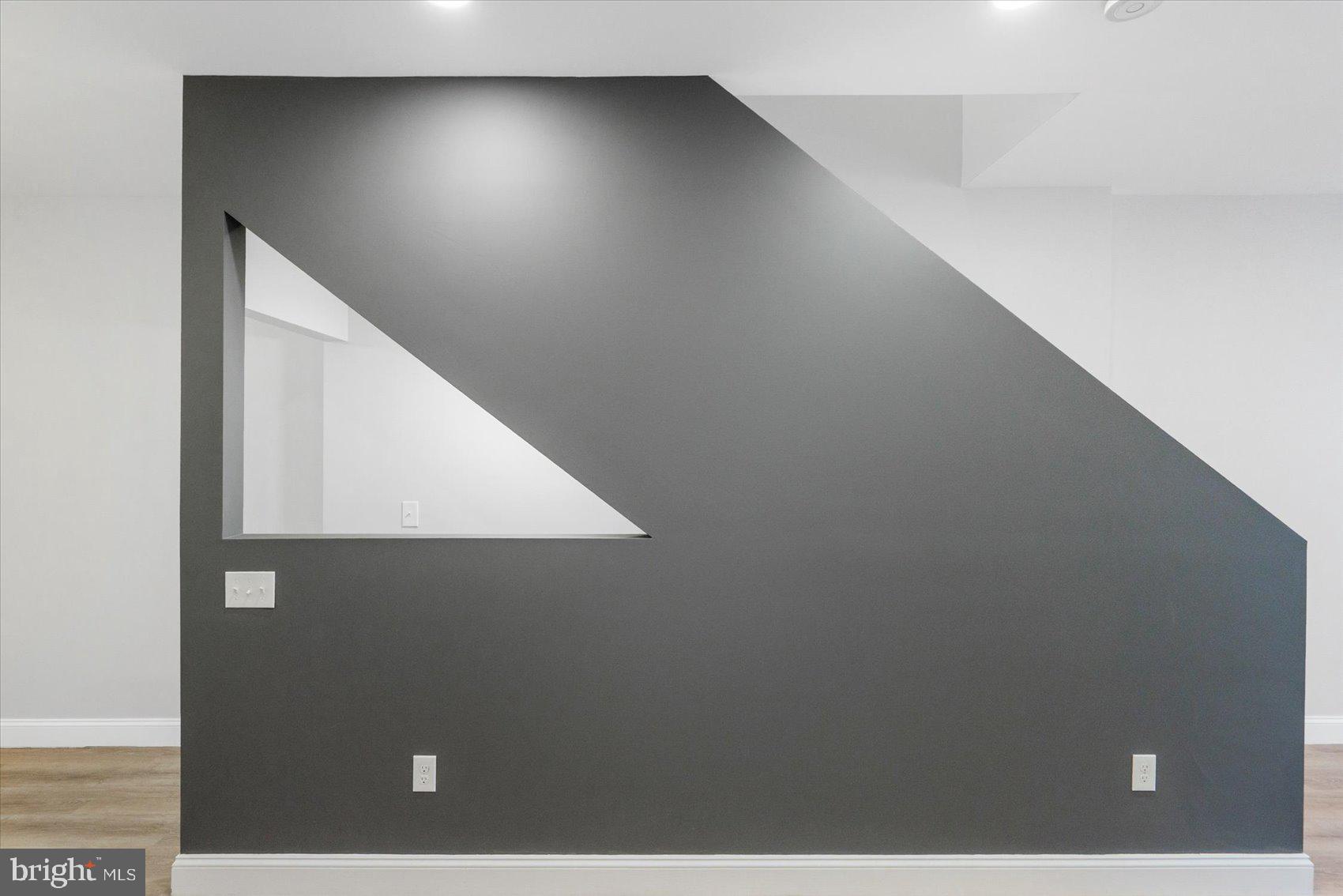 1415 East Lanvale Street Baltimore, MD 21213 - Photo 18 of 42 a view of an empty room with wooden floor