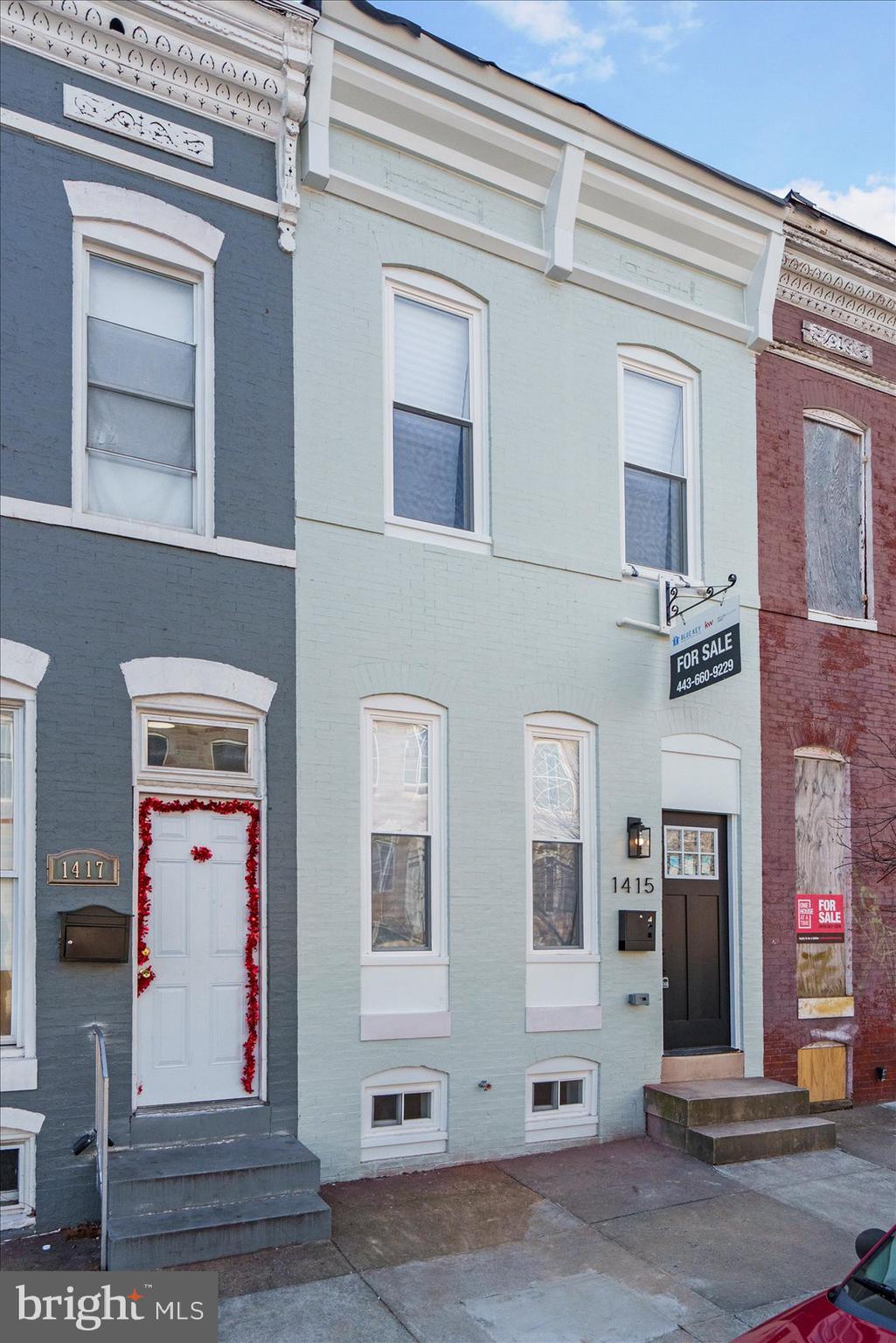 1415 East Lanvale Street Baltimore, MD 21213 - Photo 3 of 42 a front view of a building