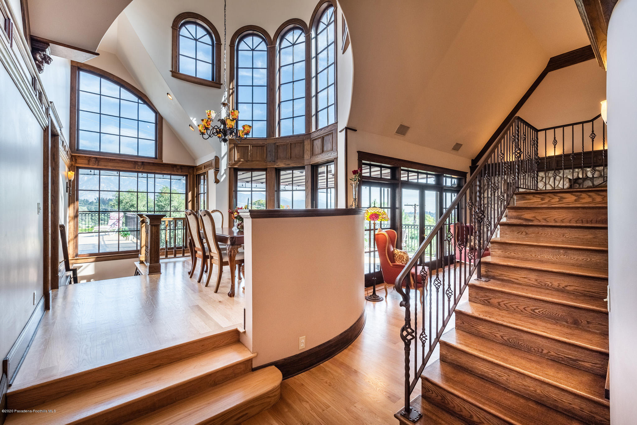 150 Sequoia Drive Pasadena, CA 91105 - Photo 11 of 53 a view of staircase with wooden floor and a rug