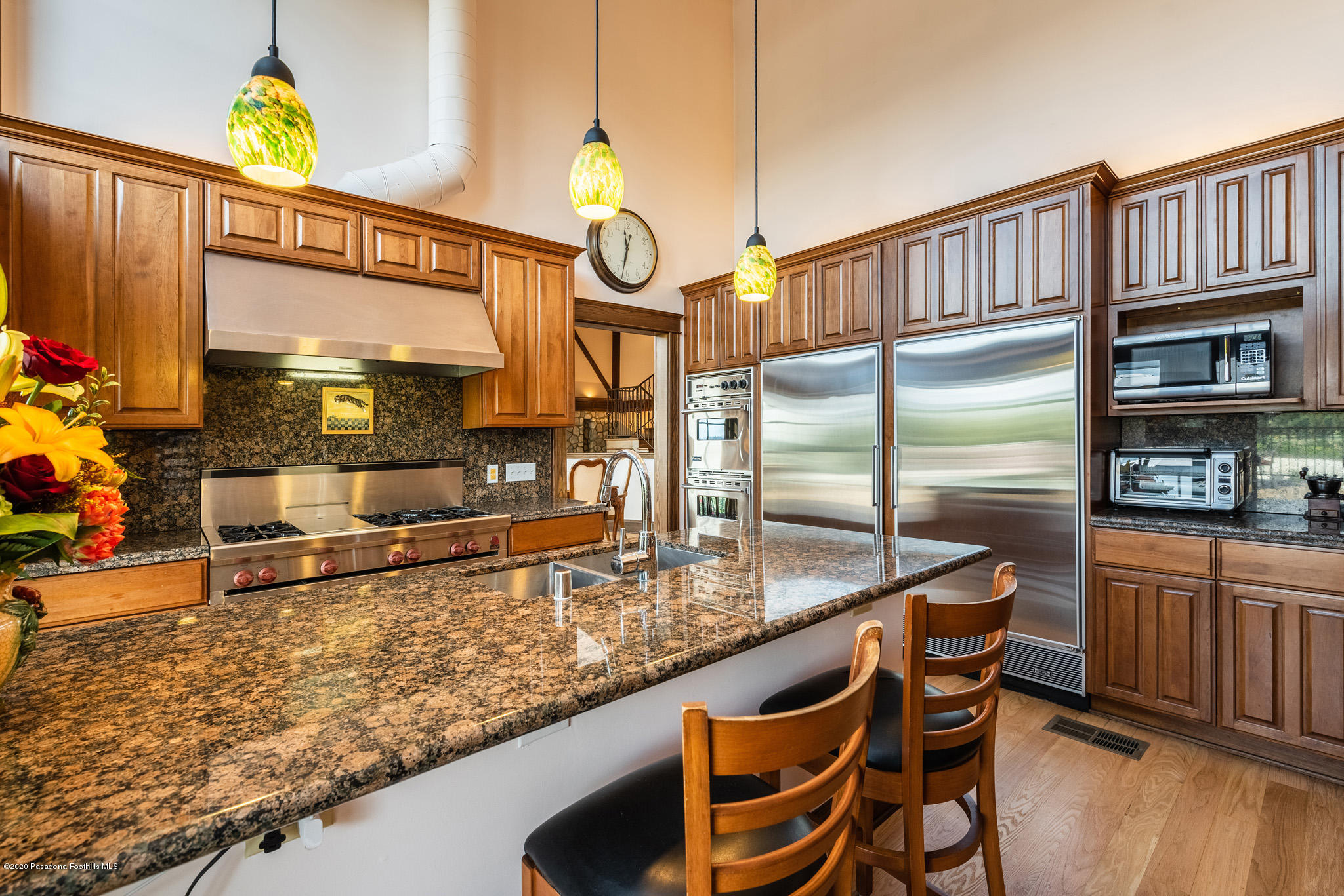 150 Sequoia Drive Pasadena, CA 91105 - Photo 14 of 53 a kitchen with stainless steel appliances granite countertop a sink and a counter top space