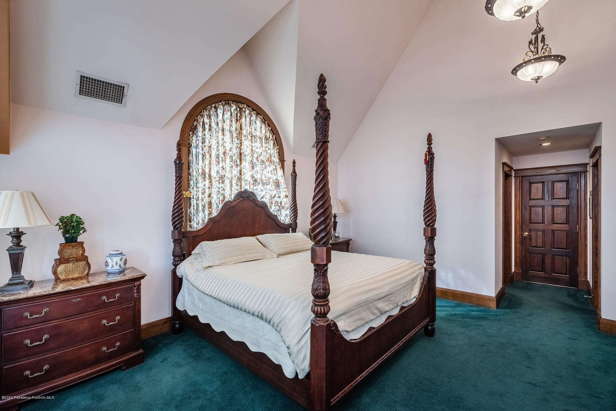 150 Sequoia Drive Pasadena, CA 91105 - Photo 19 of 53 a bed sitting in a bedroom next to a window