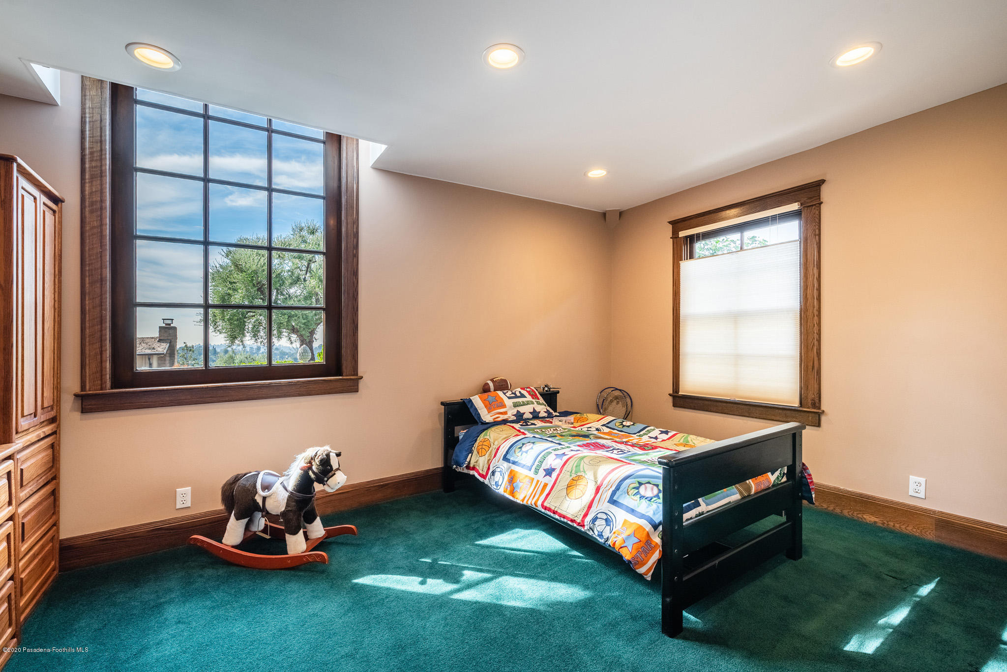 150 Sequoia Drive Pasadena, CA 91105 - Photo 21 of 53 a bedroom with a bed and a window