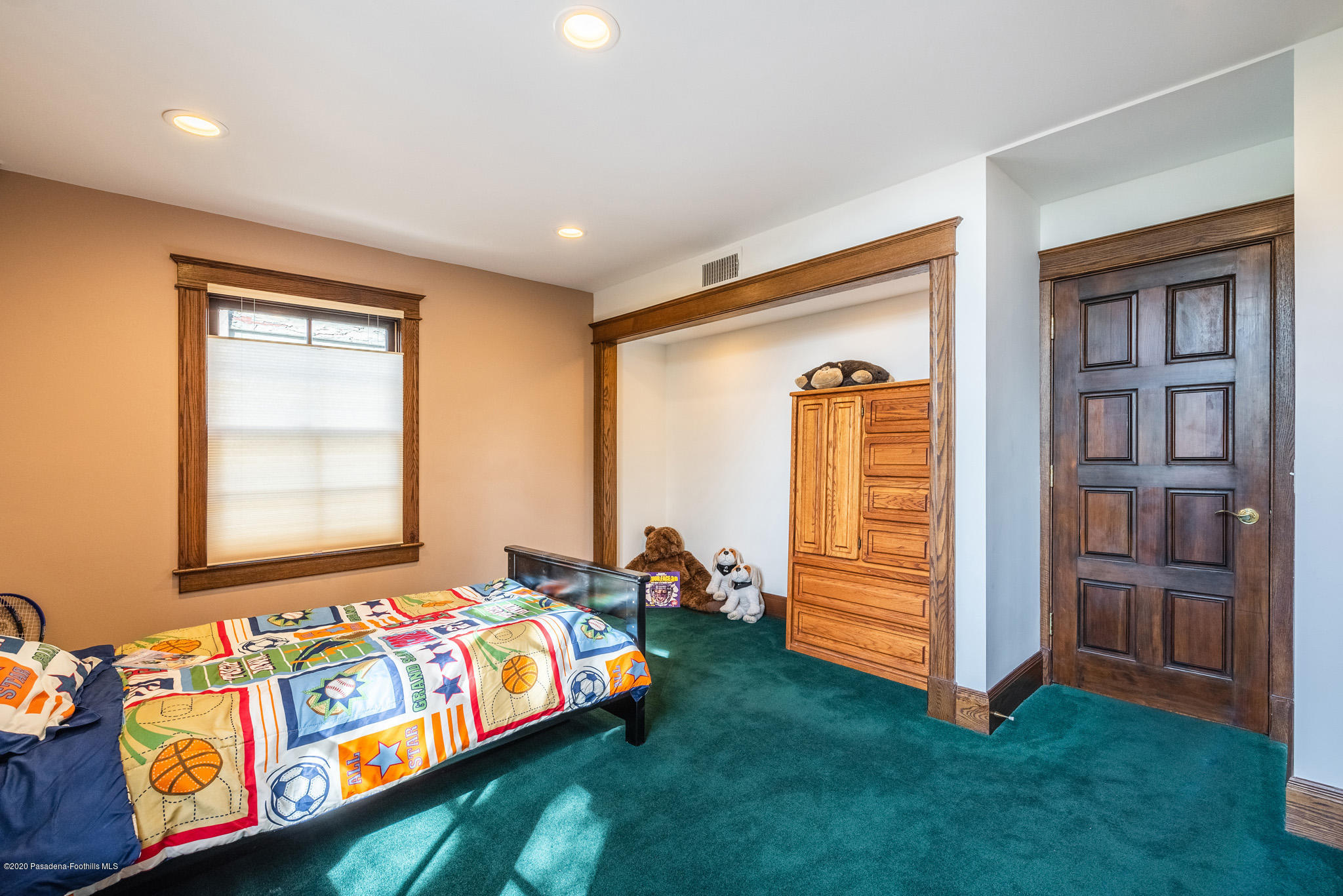 150 Sequoia Drive Pasadena, CA 91105 - Photo 22 of 53 a bedroom with a bed and a window