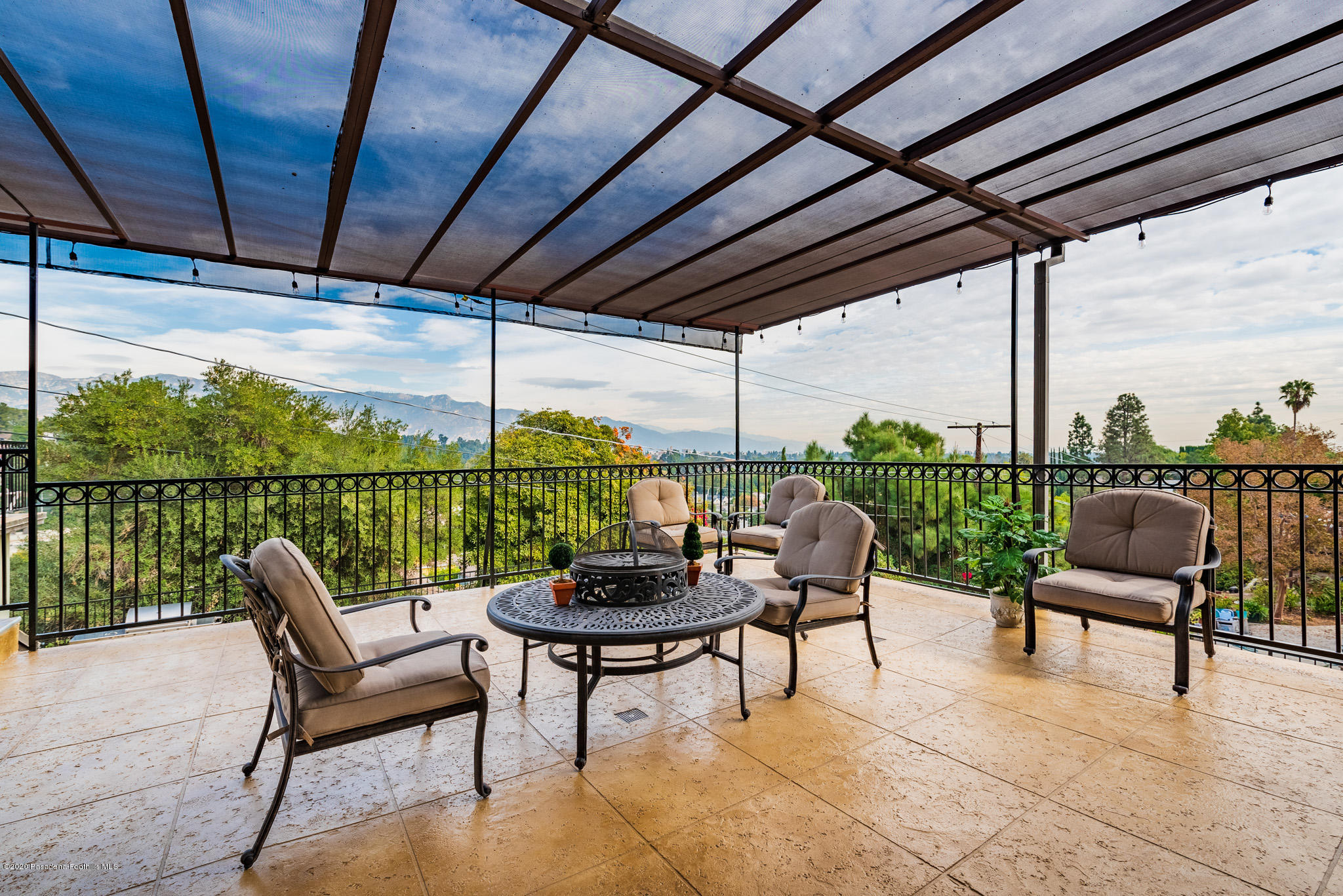 150 Sequoia Drive Pasadena, CA 91105 - Photo 39 of 53 a view of a chairs and table in patio