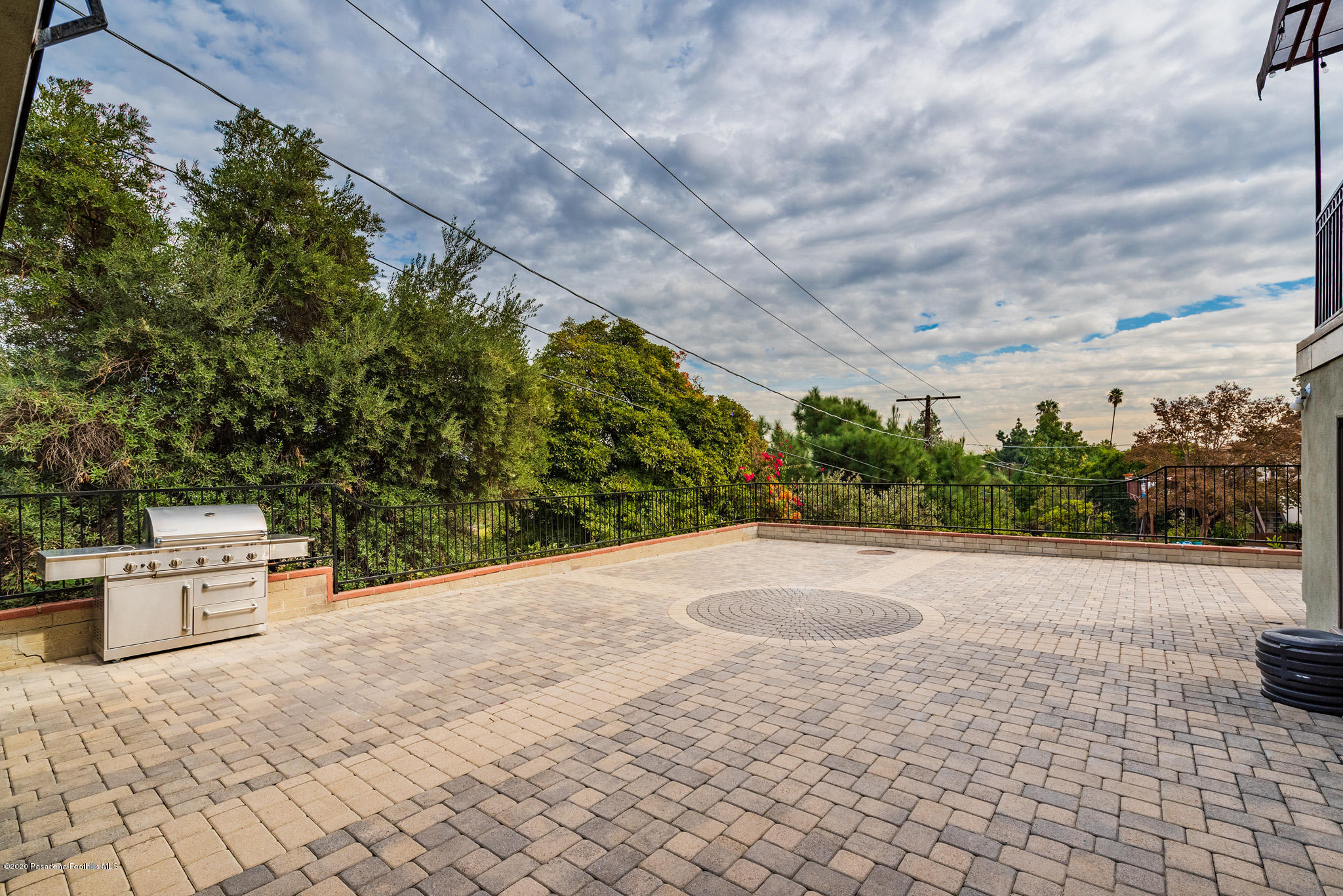 150 Sequoia Drive Pasadena, CA 91105 - Photo 45 of 53 a backyard of a house with a yard and outdoor seating
