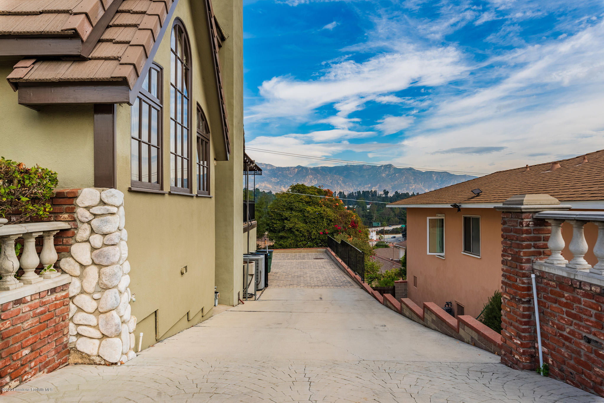 150 Sequoia Drive Pasadena, CA 91105 - Photo 46 of 53 front view of a house with a street