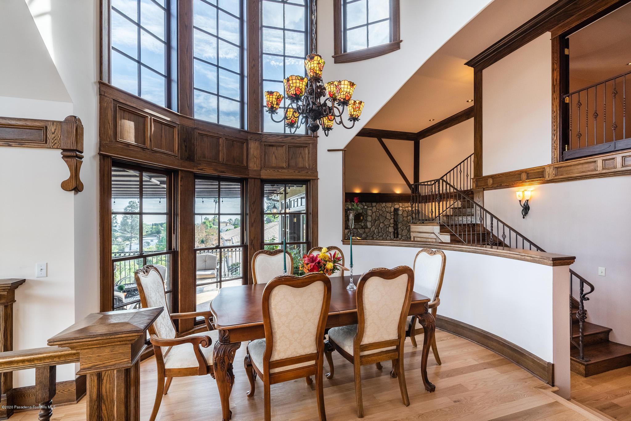 150 Sequoia Drive Pasadena, CA 91105 - Photo 10 of 53 a dining room with furniture potted plants and wooden floor