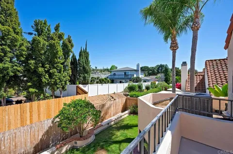 a view of balcony with furniture