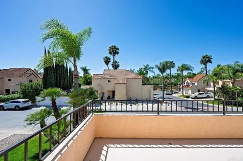 a view of a house with a swimming pool