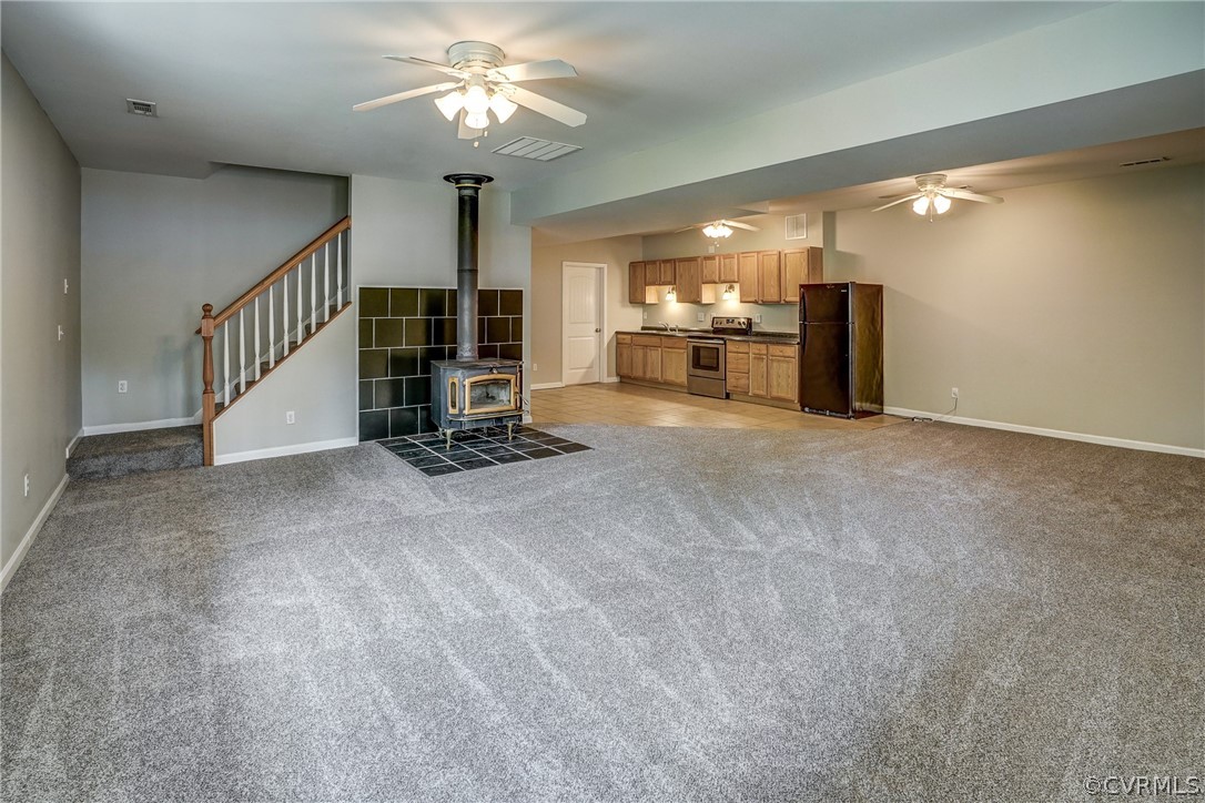 2855 Red Lane Road Powhatan, VA 23139 - Photo 21 of 42 a view of a livingroom with a furniture and chandelier fan