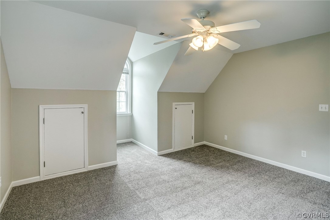 2855 Red Lane Road Powhatan, VA 23139 - Photo 32 of 42 an empty room with fan and windows