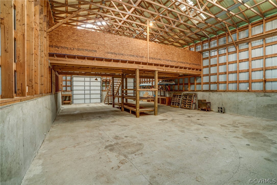 2855 Red Lane Road Powhatan, VA 23139 - Photo 37 of 42 a view of a big room with wooden roof and furniture