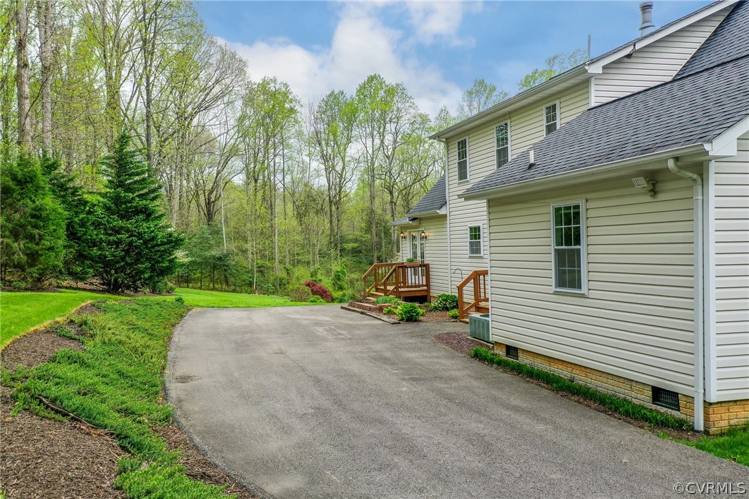 2855 Red Lane Road Powhatan, VA 23139 - Photo 39 of 42 a view of a house with backyard and sitting area