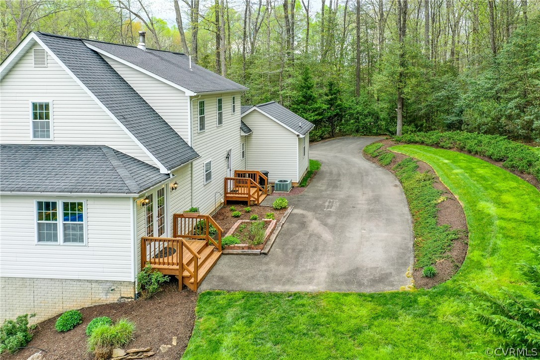 2855 Red Lane Road Powhatan, VA 23139 - Photo 40 of 42 a view of a house with backyard and garden