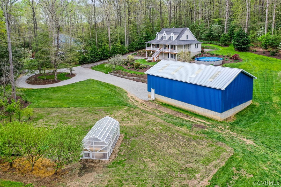 2855 Red Lane Road Powhatan, VA 23139 - Photo 4 of 42 a view of a chair and table in the garden