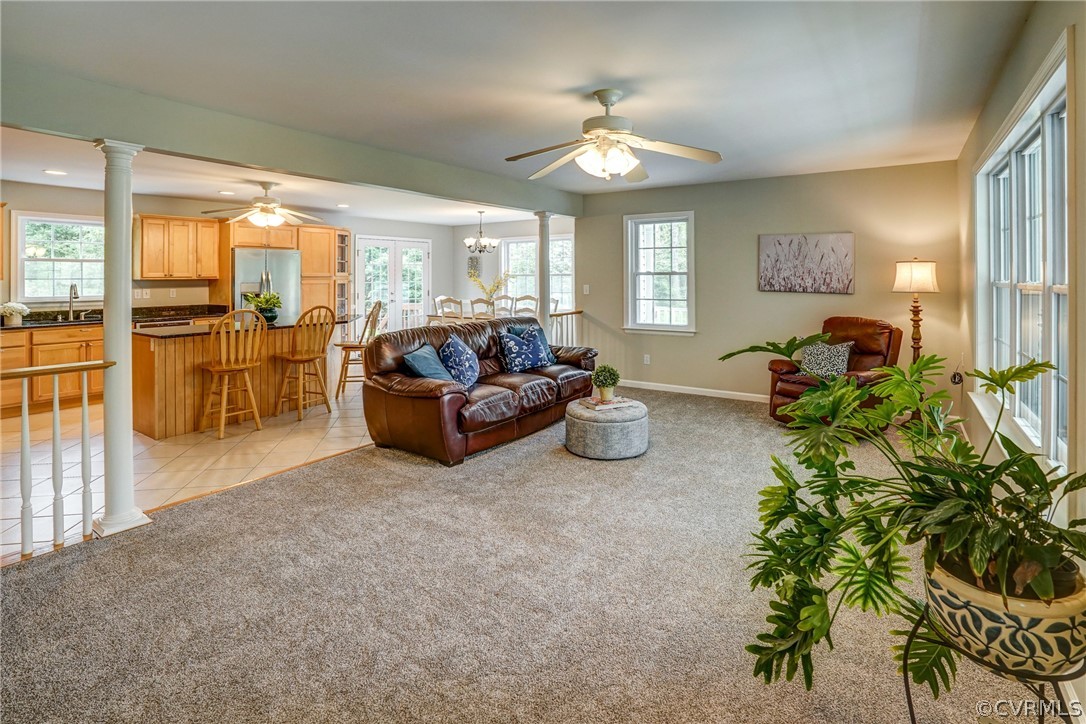 2855 Red Lane Road Powhatan, VA 23139 - Photo 7 of 42 a living room with furniture and a large window
